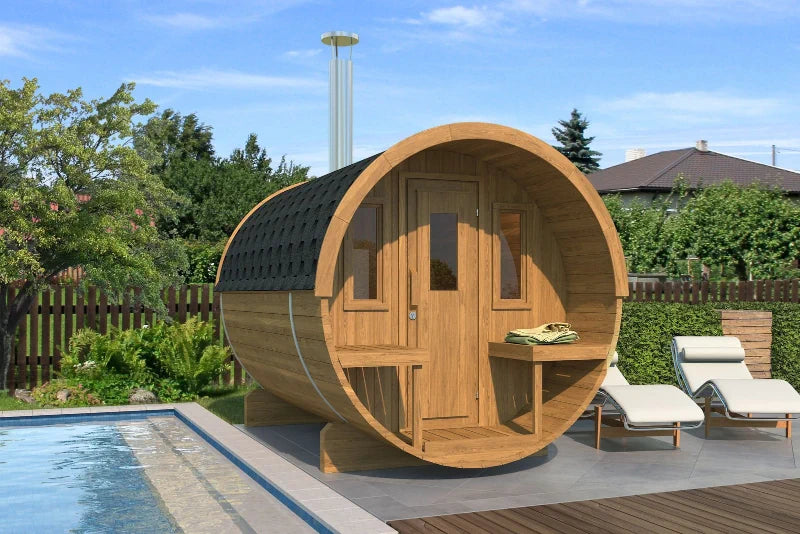 Barrel Sauna 250 with front balcony, exterior view in a garden setting