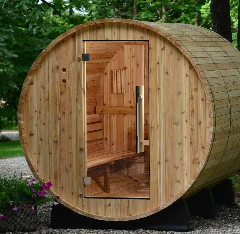Almost Heaven Princeton barrel sauna in western red cedar with the glass door open, showing the bench inside
