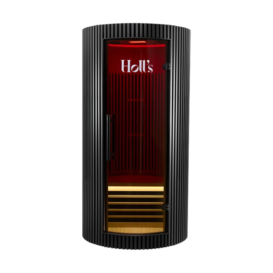 A black Holl's Moon 1 wooden sauna cabin with a curved exterior cylindrical hot air sauna with a red-tinted glass door and wood interior