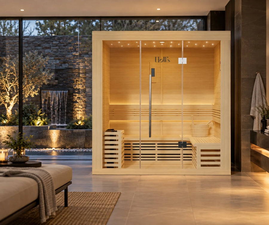 A modern wooden indoor Holl's Utopia 4 with glass doors and built-in benches, shown in a luxurious spa-like interior with warm lighting and an outdoor waterfall view.