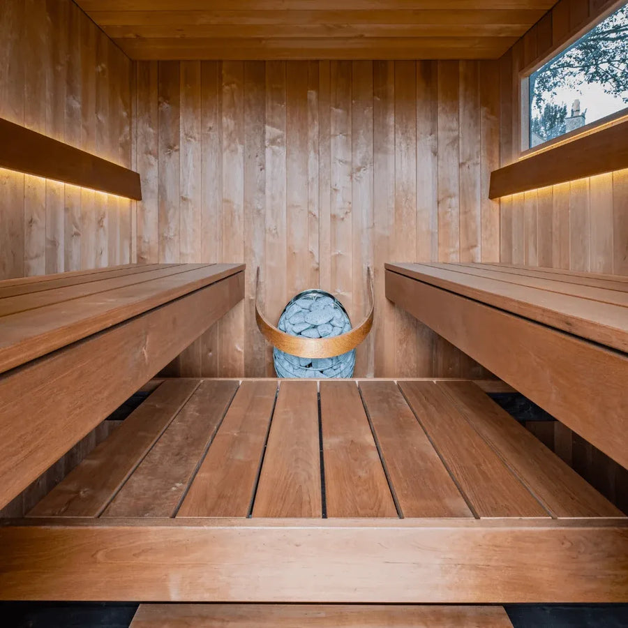 AIRA interior: opposing two tiered benches with the heater between them