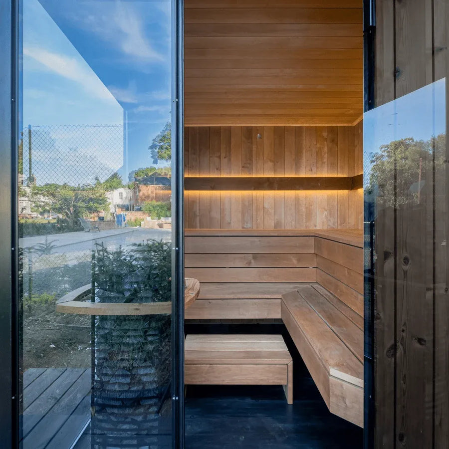EDEN interior looking out through the glass door, L shaped benches on two tiers