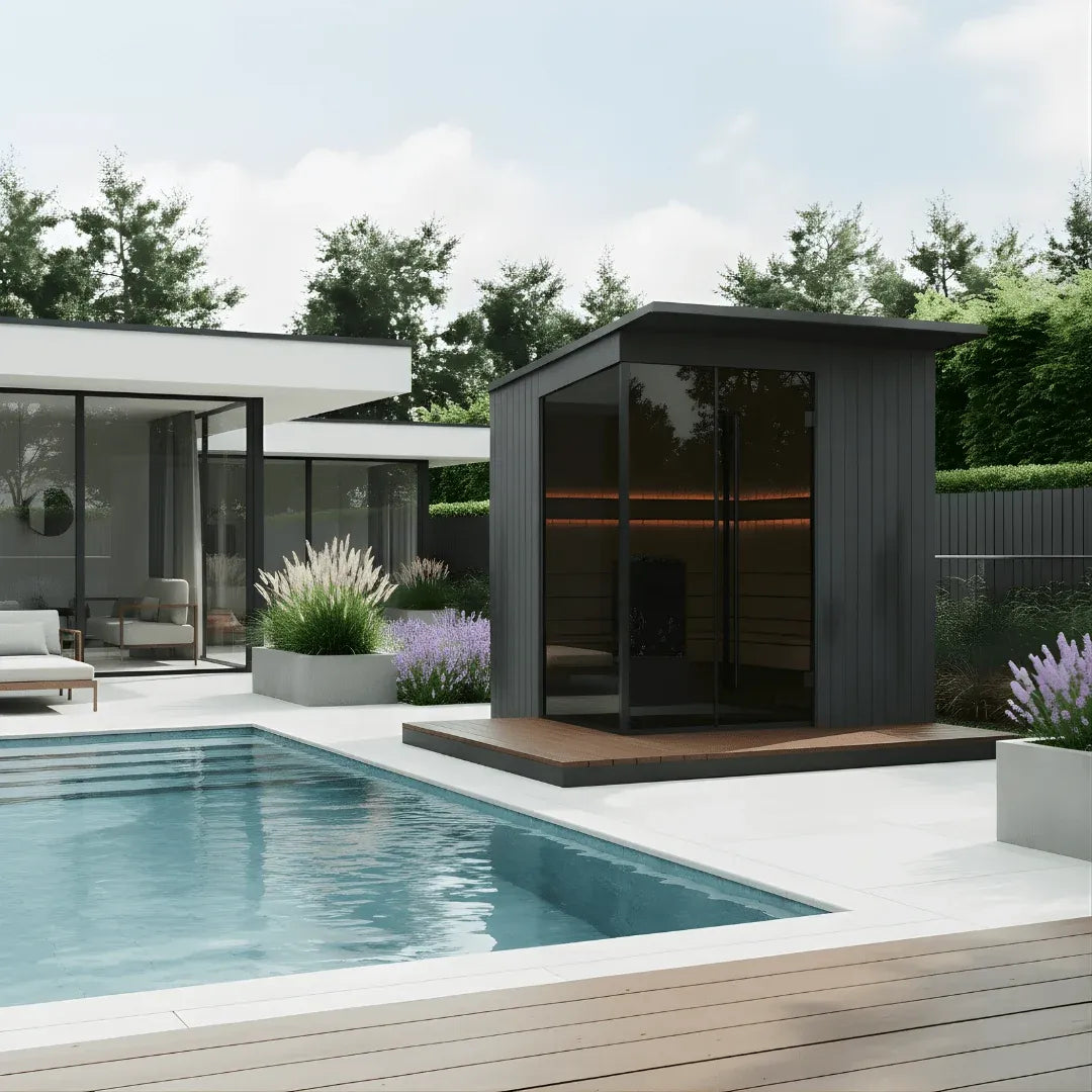 EDEN outdoor sauna in black beside a pool