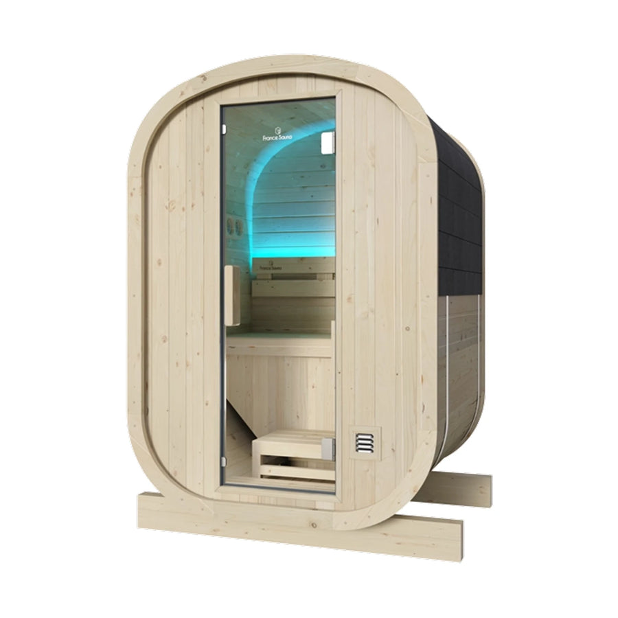 France Sauna Gaïa Urban outdoor sauna, front three quarter view with glass door and blue LED interior