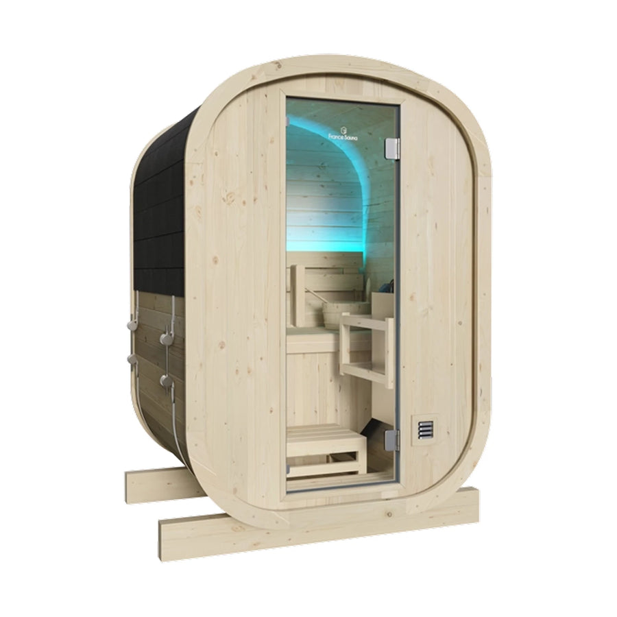 France Sauna Gaïa Urban outdoor sauna, side three quarter view showing the rounded cabin