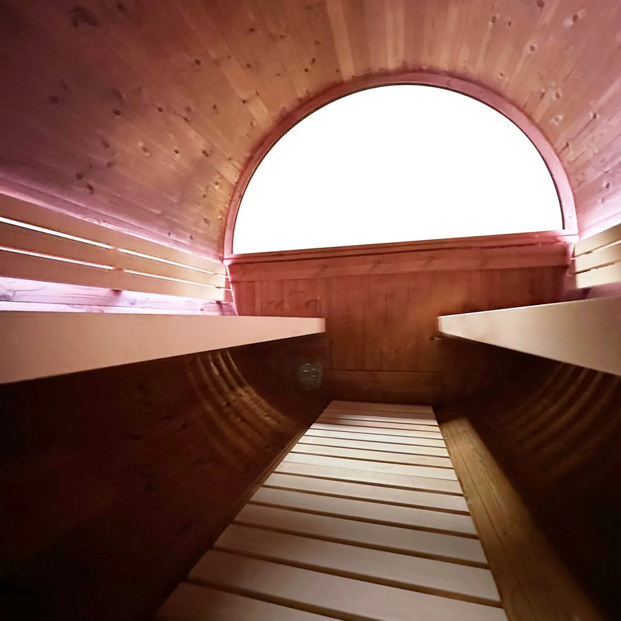 Holl's Onyxia Barrel outdoor sauna interior looking towards the rear window