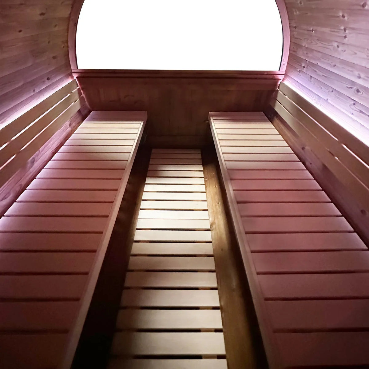 Holl's Onyxia Barrel outdoor sauna interior looking down the benches