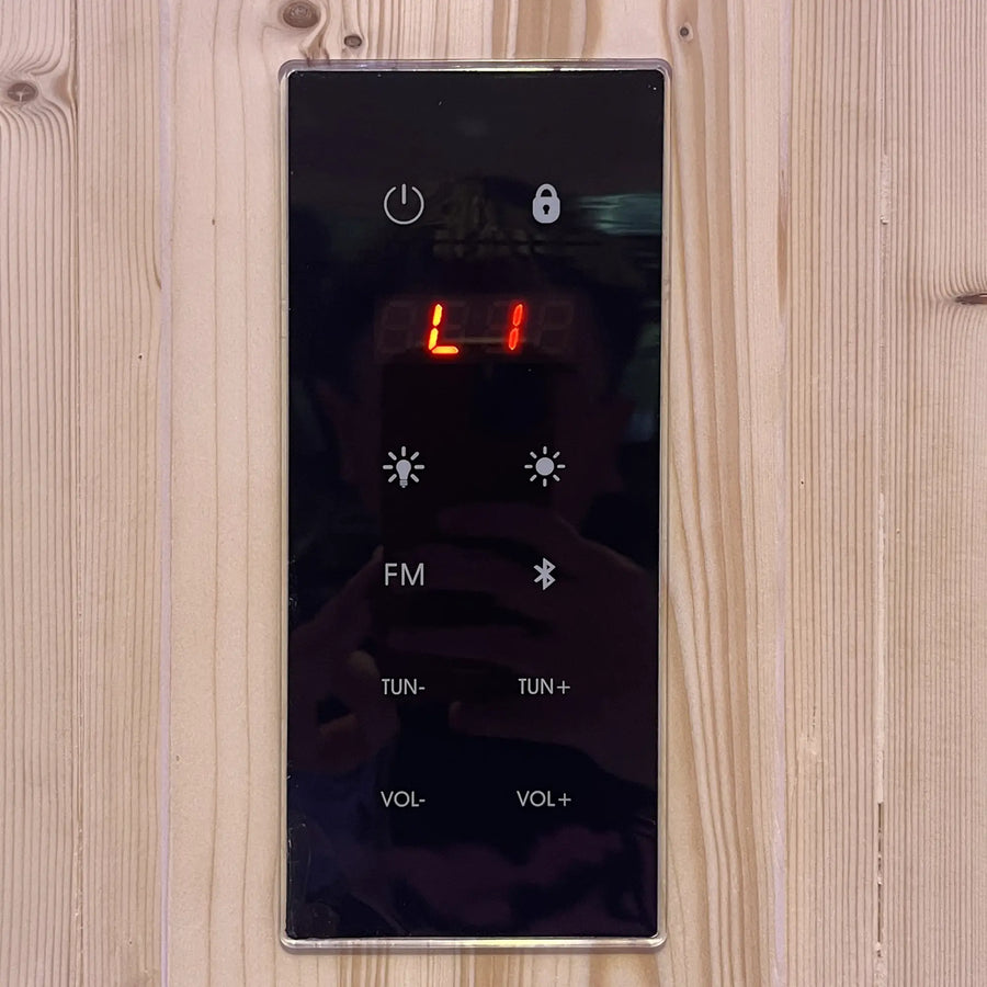 Holl's Utopia 4 touchscreen control panel on the cabin wall