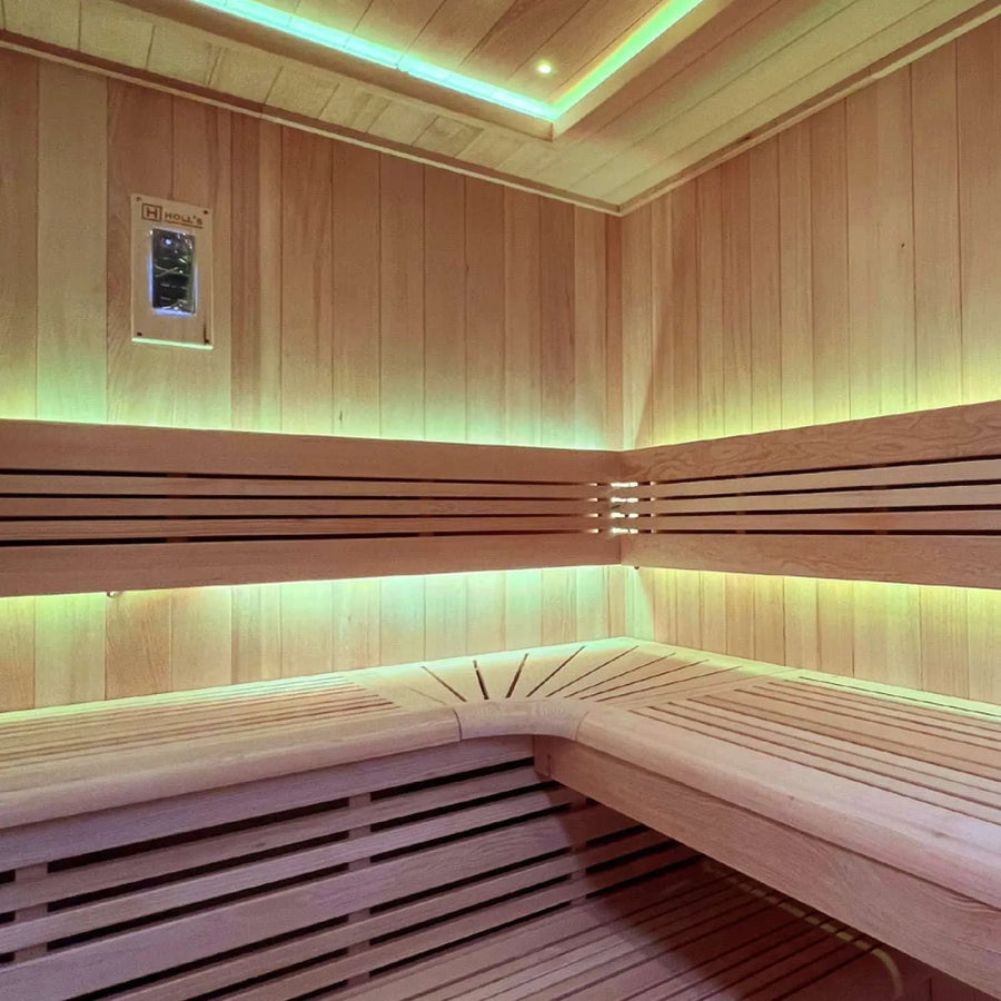 Holl's Utopia 4 interior with benches, green LED lighting and control panel