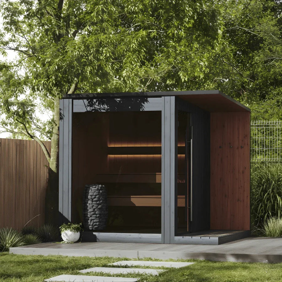 URSA outdoor sauna in the black finish in a garden